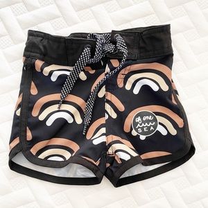 Of One Sea toddler boy swim trunks.